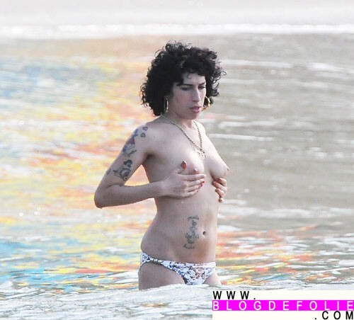 Amy Winehouse topless. 